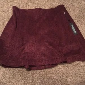 Burgundy / wine colored skirt with cutouts